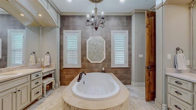 7705 Savannah, Beaumont, TX 77707 - bathroom featuring tile walls, vanity, and a bath