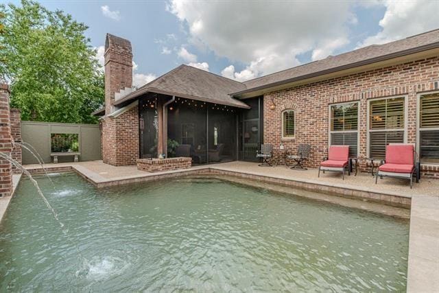 7705 Savannah, Beaumont, TX 77707 - view of swimming pool featuring a patio area and a sunroom