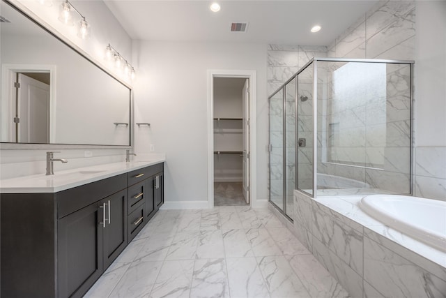 813 Laguna Green Ln, Katy, TX 77493 - bathroom featuring marble look tiles, a bath, double vanity, a marble finish shower, and recessed lighting