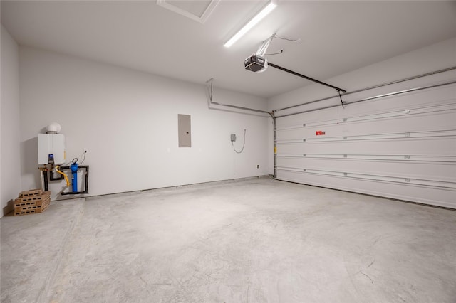 813 Laguna Green Ln, Katy, TX 77493 - garage with electric panel, a garage door opener, and tankless water heater