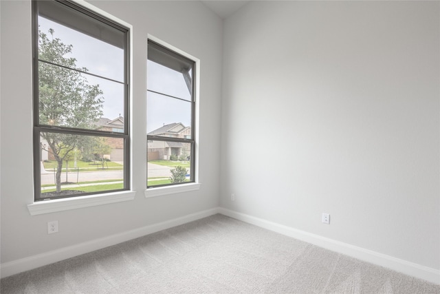 813 Laguna Green Ln, Katy, TX 77493 - carpeted empty room featuring healthy amount of natural light