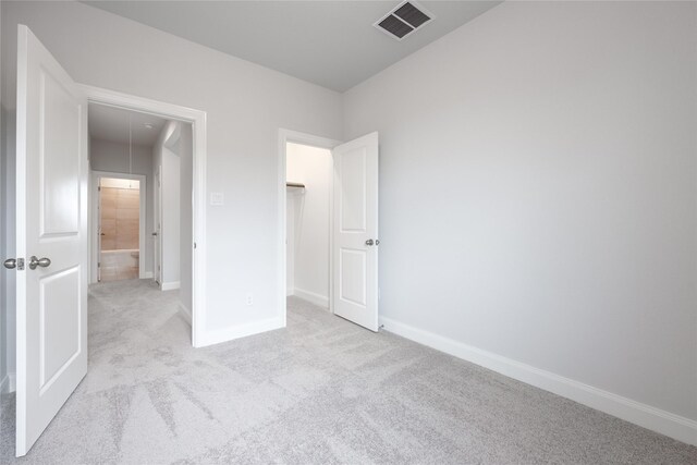 813 Laguna Green Ln, Katy, TX 77493 - unfurnished bedroom with attic access and carpet flooring