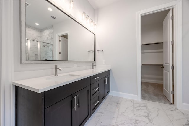 813 Laguna Green Ln, Katy, TX 77493 - full bath featuring marble finish floors, a shower stall, double vanity, and a spacious closet