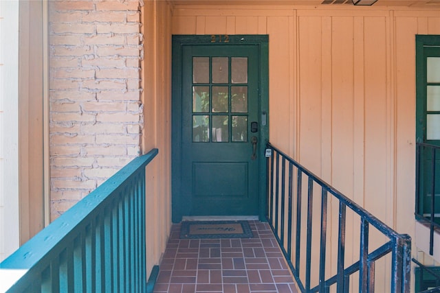 8223 Kingsbrook Rd Unit 212, Houston, TX 77024 - property entrance featuring board and batten siding