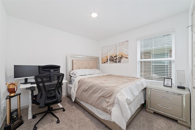 7011 Fleetwood Crescent Way, Richmond, TX 77407 - bedroom with carpet flooring, an office area, and baseboards