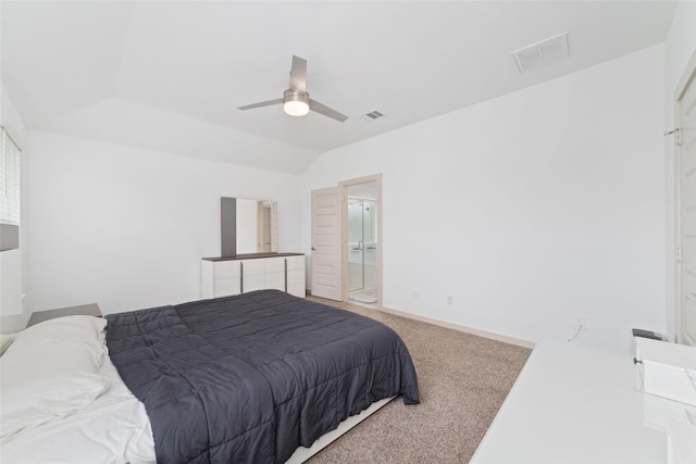 7011 Fleetwood Crescent Way, Richmond, TX 77407 - bedroom with carpet flooring, lofted ceiling, a ceiling fan, and connected bathroom