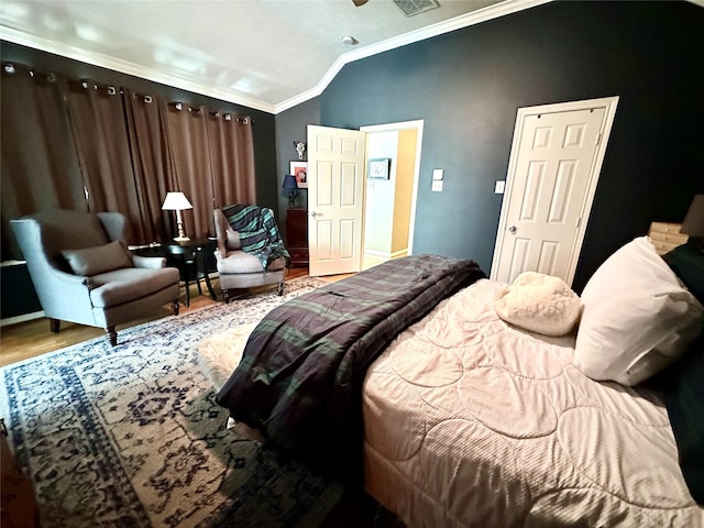 8910 Everhart Ln, Houston, TX 77040 - bedroom featuring crown molding, wood finished floors, and lofted ceiling
