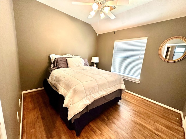 8910 Everhart Ln, Houston, TX 77040 - bedroom featuring wood finished floors, baseboards, a ceiling fan, and lofted ceiling