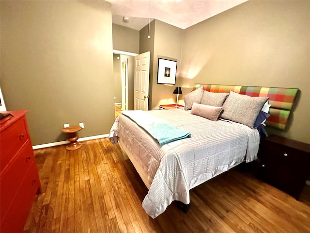 8910 Everhart Ln, Houston, TX 77040 - bedroom featuring hardwood / wood-style floors and baseboards