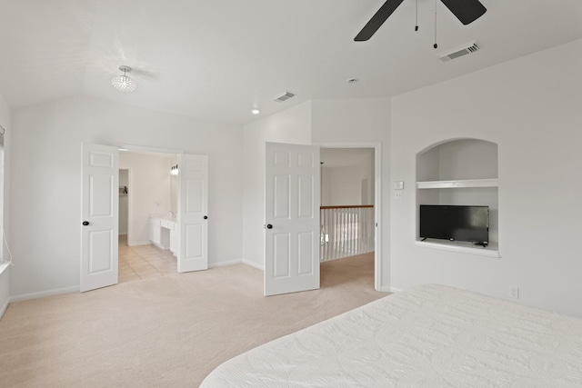 6426 Savannah Pines Dr, Katy, TX 77449 - unfurnished bedroom with carpet flooring, baseboards, connected bathroom, ceiling fan, and vaulted ceiling