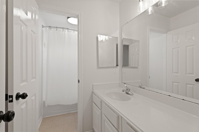6426 Savannah Pines Dr, Katy, TX 77449 - full bath with vanity, tile patterned floors, shower / tub combo with curtain, and baseboards
