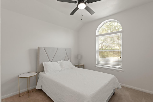 6426 Savannah Pines Dr, Katy, TX 77449 - bedroom with carpet floors, baseboards, ceiling fan, and vaulted ceiling