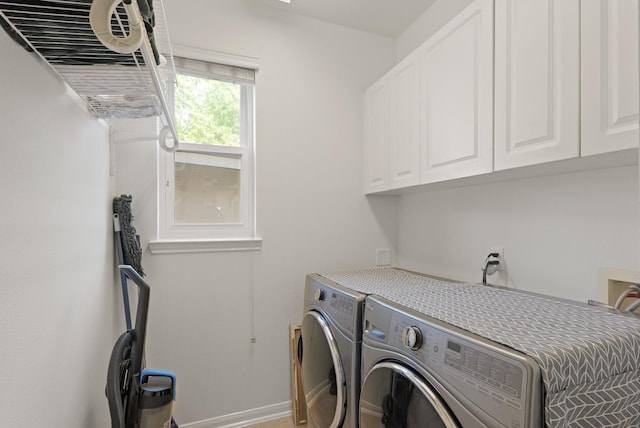 6426 Savannah Pines Dr, Katy, TX 77449 - laundry room with washer and dryer, cabinet space, and baseboards