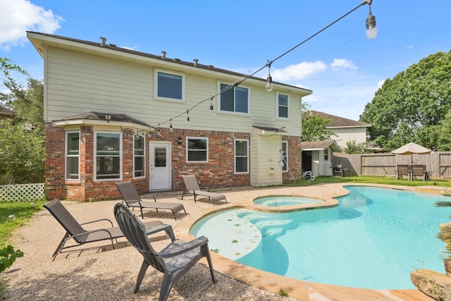 6426 Savannah Pines Dr, Katy, TX 77449 - view of pool with a patio area, a fenced backyard, and a pool with connected hot tub