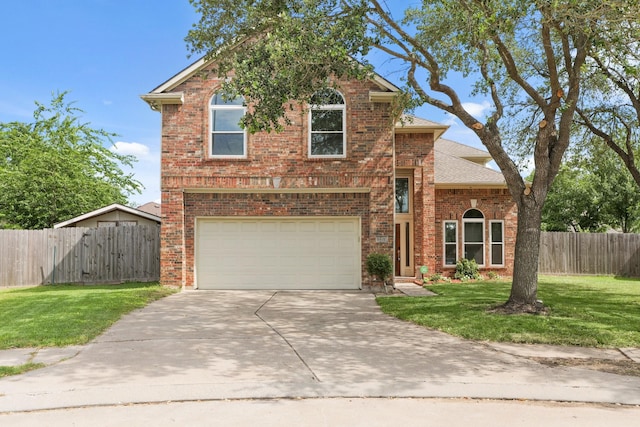 6426 Savannah Pines Dr, Katy, TX 77449 - traditional-style home with brick siding, concrete driveway, an attached garage, and a shingled roof