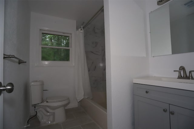 345 Byrd St, Vidor, TX 77662 - full bath with toilet, vanity, tile patterned floors, and shower / bath combo