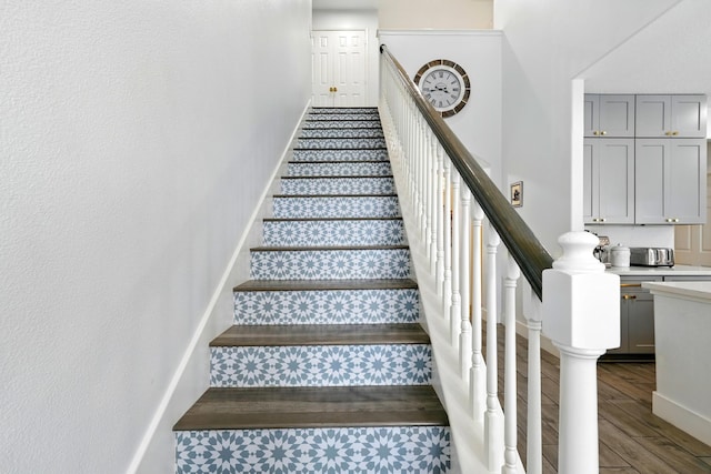 16522 N Canyon Trace Dr, Houston, TX 77095 - staircase with wood finished floors and baseboards