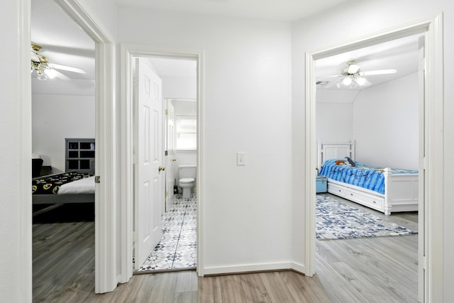 16522 N Canyon Trace Dr, Houston, TX 77095 - corridor featuring wood finished floors and baseboards