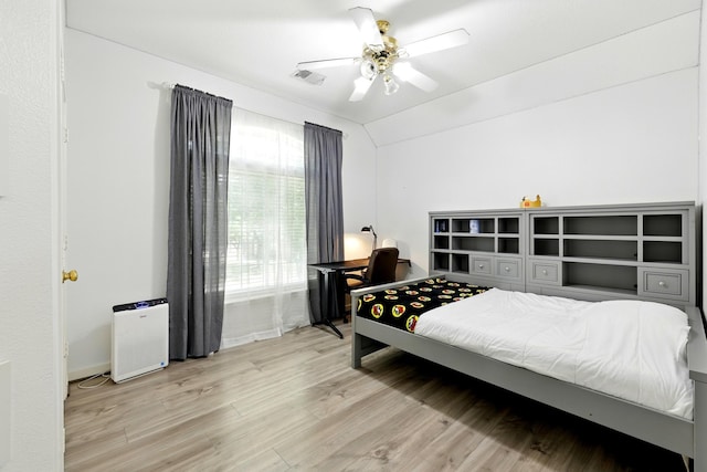 16522 N Canyon Trace Dr, Houston, TX 77095 - bedroom with wood finished floors, ceiling fan, and lofted ceiling