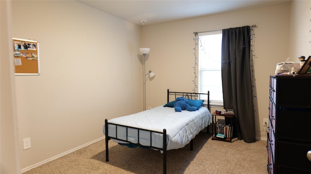 40607 Creekside Bluff Trl, Magnolia, TX 77354 - bedroom with light carpet and baseboards