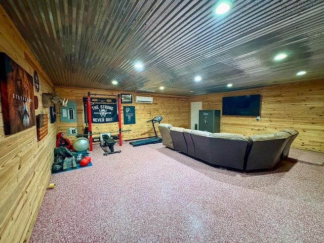 18 Joe Werner Ln, Huntsville, TX 77320 - home theater room featuring wooden walls, a wall mounted air conditioner, carpet, and recessed lighting