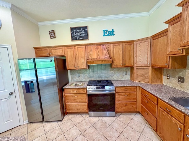 18 Joe Werner Ln, Huntsville, TX 77320 - kitchen with stainless steel appliances, ornamental molding, brown cabinets, backsplash, and stone counters