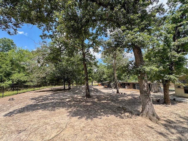 18 Joe Werner Ln, Huntsville, TX 77320 - view of yard featuring an outbuilding