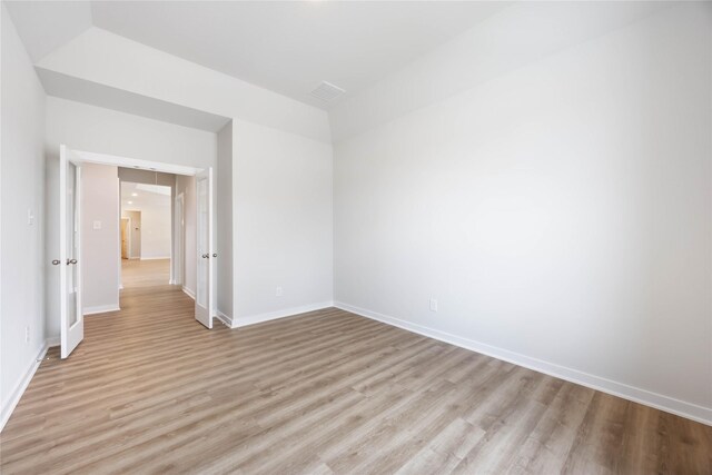 540 Barton Place Dr, Cleveland, TX 77327 - spare room with light wood-type flooring and baseboards