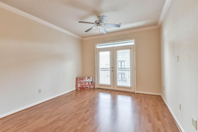 1711 Old Spanish Trl Unit 406, Houston, TX 77054 - spare room with french doors, light wood-style floors, crown molding, a ceiling fan, and baseboards