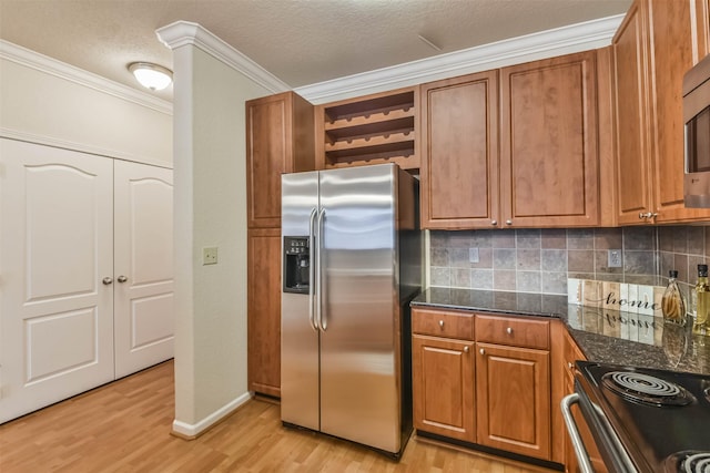 1711 Old Spanish Trl Unit 406, Houston, TX 77054 - kitchen featuring stainless steel fridge with ice dispenser, ornamental molding, light wood-type flooring, tasteful backsplash, and open shelves