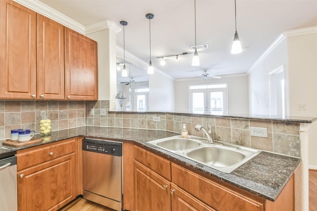 1711 Old Spanish Trl Unit 406, Houston, TX 77054 - kitchen with dishwasher, a sink, a ceiling fan, ornamental molding, and brown cabinets