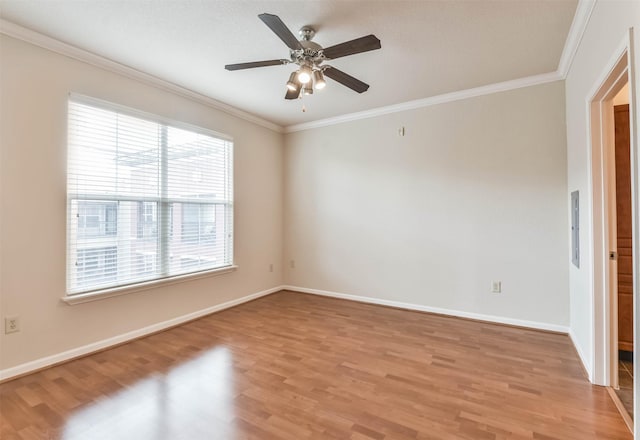 1711 Old Spanish Trl Unit 406, Houston, TX 77054 - empty room with light wood-style floors, ornamental molding, a ceiling fan, and baseboards