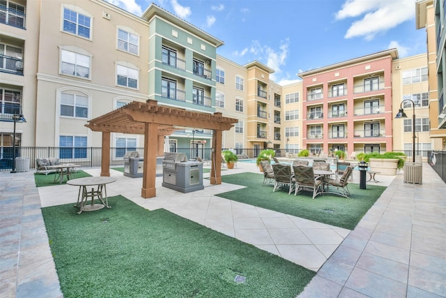 1711 Old Spanish Trl Unit 406, Houston, TX 77054 - view of property's community featuring a pergola