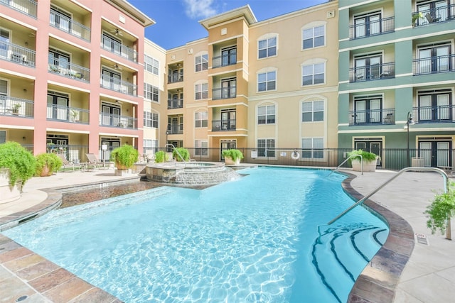 1711 Old Spanish Trl Unit 406, Houston, TX 77054 - view of pool with a pool with connected hot tub