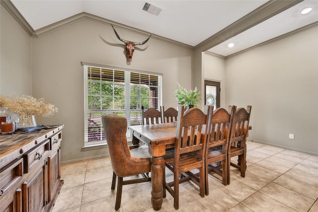 1586 Ancient Oak Ln, Conroe, TX 77301 - dining area with crown molding, light tile patterned floors, vaulted ceiling, and recessed lighting