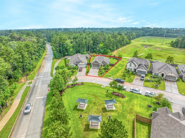 1586 Ancient Oak Ln, Conroe, TX 77301 - aerial perspective of suburban area with a forest and property parcel outlined