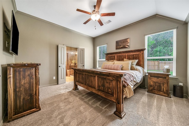 1586 Ancient Oak Ln, Conroe, TX 77301 - carpeted bedroom featuring lofted ceiling, ensuite bathroom, crown molding, and ceiling fan