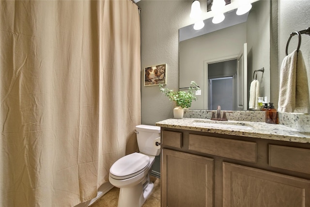 1586 Ancient Oak Ln, Conroe, TX 77301 - full bathroom with a textured wall, vanity, and curtained shower