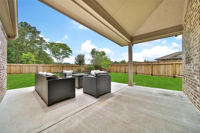 1586 Ancient Oak Ln, Conroe, TX 77301 - fenced backyard with an outdoor hangout area and a patio area