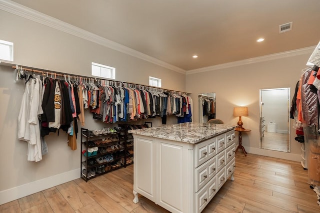 5950 Keith Rd, Lumberton, TX 77657 - walk in closet featuring light wood-style flooring