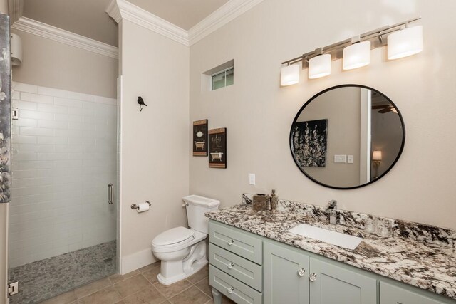5950 Keith Rd, Lumberton, TX 77657 - bathroom with vanity, a shower stall, crown molding, toilet, and tile patterned floors