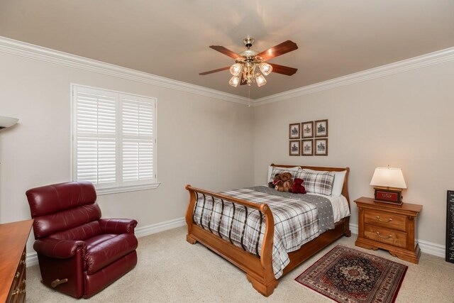 5950 Keith Rd, Lumberton, TX 77657 - carpeted bedroom with crown molding, baseboards, and a ceiling fan