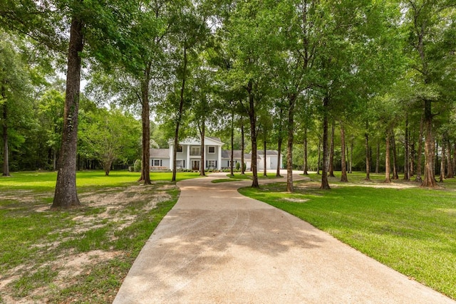 5950 Keith Rd, Lumberton, TX 77657 - view of home's community featuring a lawn