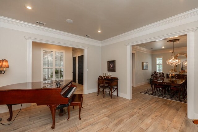 5950 Keith Rd, Lumberton, TX 77657 - living area featuring light wood finished floors, ornamental molding, a chandelier, baseboards, and recessed lighting