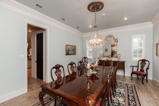 5950 Keith Rd, Lumberton, TX 77657 - dining area with light wood-style floors, a chandelier, ornamental molding, baseboards, and recessed lighting