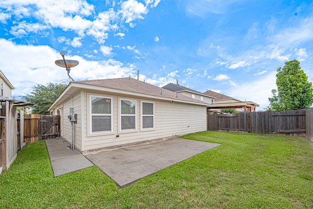 1219 Newsome Glenn Dr, Houston, TX 77090 - back of house with a patio area