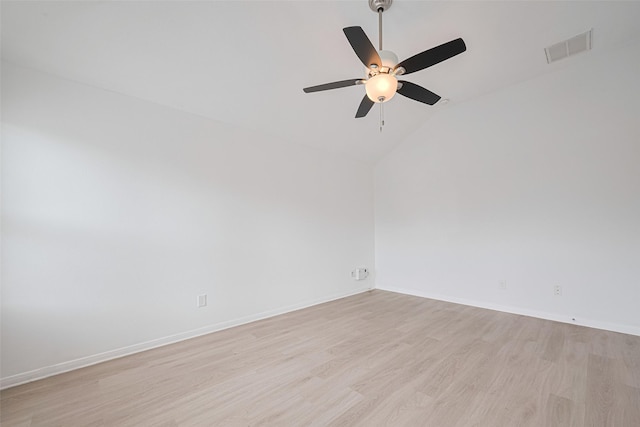 1219 Newsome Glenn Dr, Houston, TX 77090 - unfurnished room with lofted ceiling, light wood-style floors, a ceiling fan, and baseboards