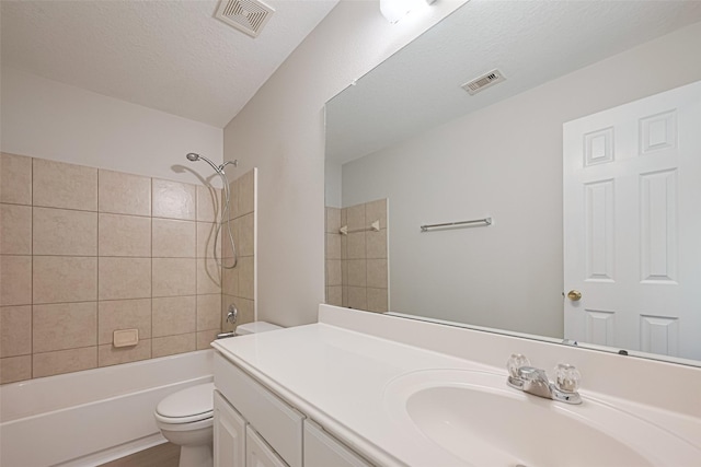 1219 Newsome Glenn Dr, Houston, TX 77090 - bathroom featuring vanity, toilet, and  shower combination