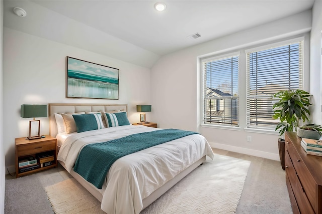 13424 Sun Cay Dr, Houston, TX 77047 - bedroom with baseboards, lofted ceiling, and light carpet