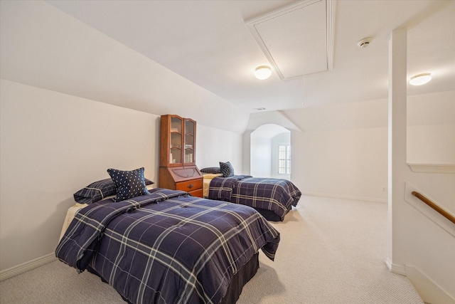 2214 Potomac Dr Unit 2, Houston, TX 77057 - carpeted bedroom featuring attic access, vaulted ceiling, and baseboards